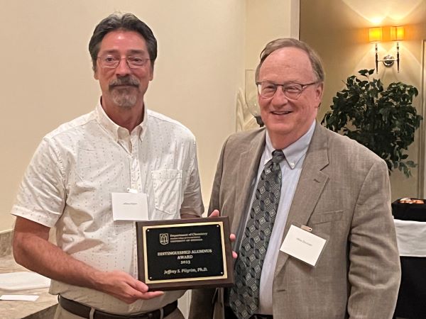 2023 Distinguished Alumnus Award winner Jeff Pilgrim and Dr. Michael Duncan