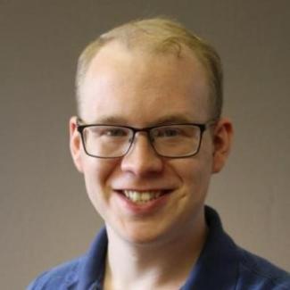 Portrait of Joshua Bledsoe, graduate student speaker