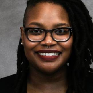 Headshot of Jana Carpenter, speaker, Black woman wearing glasses