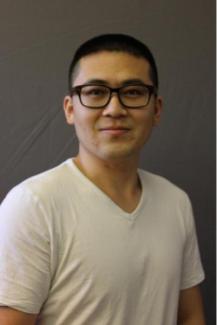 Headshot of Haofan Ji, Asian man wearing glasses and a white shirt
